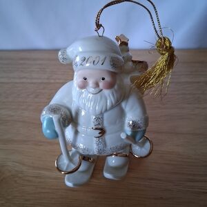 Charming Santa Claus Ornament with Gold and White Details